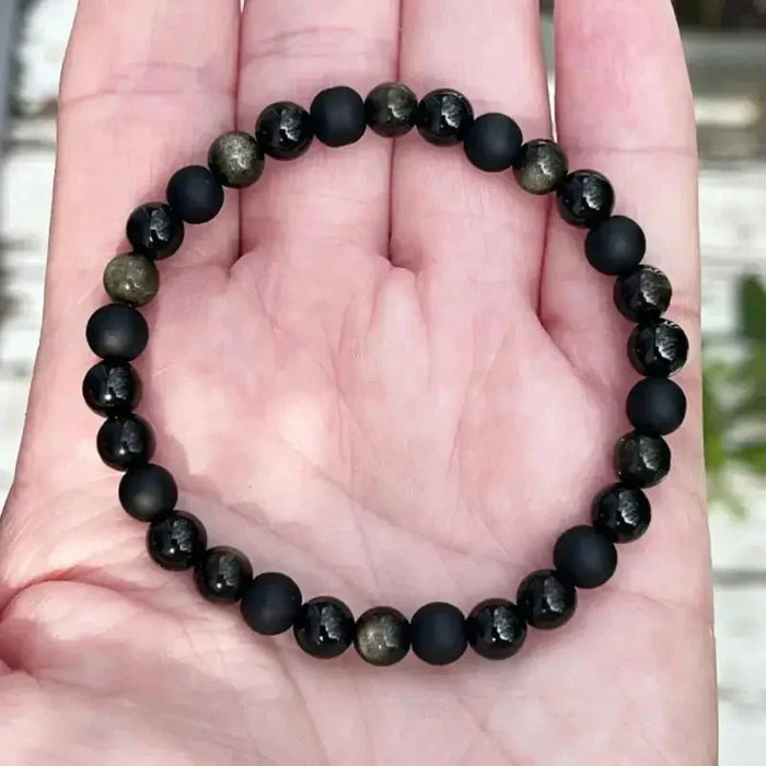Armband mit matten und glänzenden Perlen in Schwarz
