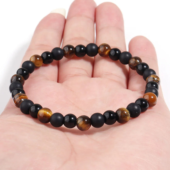 Armband mit matten und glänzenden Perlen in Schwarz
